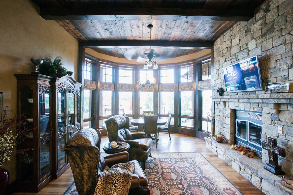 ranch style home with custom wood windows