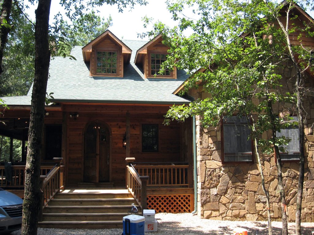 cabin home project featuring wood windows