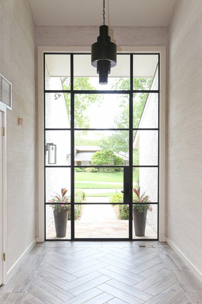 front door made out of solid steel frames and impact resistant windows